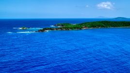 Rugged Caribbean island coastline in sapphire blue water, Culebra, Puerto Rico  Aerial Stock Photos | AX102_107.0000000F