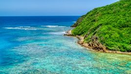 Reefs in sapphire blue waters and a rugged coastline, Culebra, Puerto Rico  Aerial Stock Photos | AX102_114.0000000F