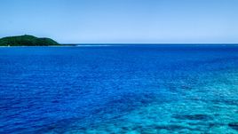 Turquoise ocean waters near a small island, Culebra, Puerto Rico Aerial Stock Photos | AX102_132.0000290F