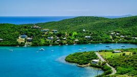 Oceanfront island homes overlooking sapphire waters, Culebra, Puerto Rico Aerial Stock Photos | AX102_155.0000000F