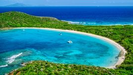 Catamarans in turquoise waters beside a white sand Caribbean beach, Culebrita, Puerto Rico Aerial Stock Photos | AX102_184.0000156F