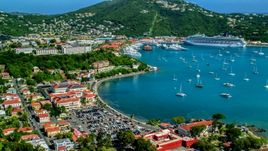 Sailboats and cruise ship in the harbor beside a Caribbean island town, Charlotte Amalie, St Thomas  Aerial Stock Photos | AX102_224.0000000F