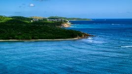 Oceanfront condominiums overlooking sapphire blue waters, Southside, St Thomas  Aerial Stock Photos | AX102_235.0000000F