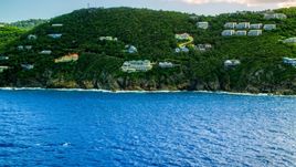 Hillside oceanfront island homes by sapphire waters, Northside, St Thomas Aerial Stock Photos | AX102_262.0000000F