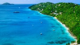 Sailboats in turquoise Caribbean waters and oceanfront island homes, Magens Bay, St Thomas  Aerial Stock Photos | AX102_273.0000182F