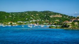 Blue Caribbean waters in the harbor near hillside homes, Cruz Bay, St John Aerial Stock Photos | AX103_029.0000072F