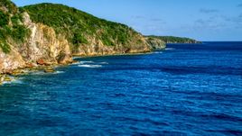 Coastal cliffs along sapphire blue Caribbean waters, Central, St John Aerial Stock Photos | AX103_050.0000066F