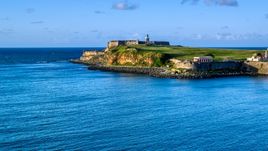 A view of Fort San Felipe del Morro, Old San Juan, Puerto Rico, sunset Aerial Stock Photos | AX104_009.0000000F