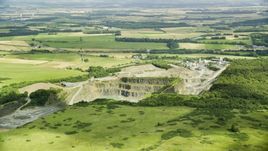 A quarry surrounded by farmland, Denny, Scotland Aerial Stock Photos | AX109_008.0000000F