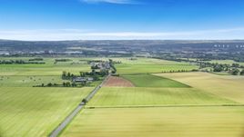 Farms and farm fields by A905 highway, Falkirk, Scotland Aerial Stock Photos | AX109_116.0000115F