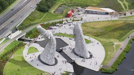 The backside of the iconic Kelpies sculptures, Falkirk, Scotland Aerial Stock Photos | AX109_125.0000042F
