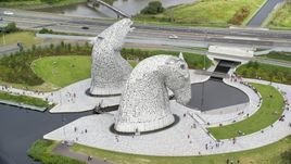 Profile view of The Kelpies sculptures in Falkirk, Scotland Aerial Stock Photos | AX109_127.0000201F
