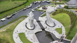 The front of The Kelpies sculptures, Falkirk, Scotland Aerial Stock Photos | AX109_130.0000169F