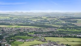 Farmland and a Scottish village, Bonnybridge, Scotland Aerial Stock Photos | AX109_166.0000053F