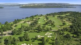 Loch Lomond Golf Course beside the water, Luss, Scottish Highlands, Scotland Aerial Stock Photos | AX110_116.0000000F