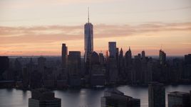World Trade Center skyline across Hudson River at sunrise in Lower Manhattan, New York City Aerial Stock Photos | AX118_030.0000060F