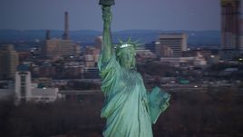 Front of the Statue of Liberty at sunrise, New York Aerial Stock Photos | AX118_048.0000078F