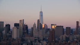 Freedom Tower and skyscrapers at sunrise in Lower Manhattan, New York City Aerial Stock Photos | AX118_070.0000078F