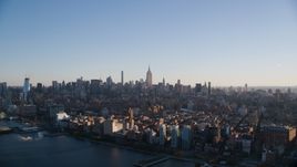 Midtown Manhattan seen from Chelsea at sunrise in New York City Aerial Stock Photos | AX118_158.0000100F