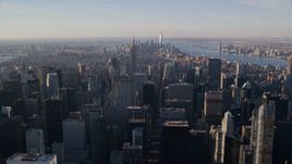 Midtown and Downtown Manhattan skyscrapers at sunrise in New York City Aerial Stock Photos | AX118_198.0000141F