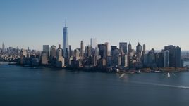 Skyline of Lower Manhattan across the Hudson River in New York City Aerial Stock Photos | AX119_014.0000094F