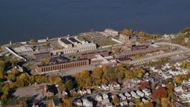 The riverfront Sing Sing Prison in Autumn, Ossining, New York Aerial Stock Photos | AX119_114.0000130F