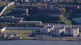 Riverfront buildings at Sing Sing Prison in Autumn, Ossining, New York Aerial Stock Photos | AX119_123.0000182F