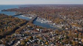 Marinas on the Mianus River by homes in Autumn, Greenwich, Connecticut Aerial Stock Photos | AX119_232.0000028F