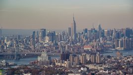 Midtown Manhattan skyline across the East River, seen from Brooklyn in Autumn, New York City Aerial Stock Photos | AX120_083.0000197F