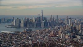 Lower Manhattan skyline and East River, seen from Brooklyn in Autumn, New York City Aerial Stock Photos | AX120_086.0000097F