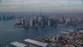 Lower Manhattan skyscrapers and the East River in Autumn, New York City Aerial Stock Photos | AX120_089.0000292F