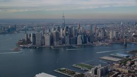 Lower Manhattan across the East River in Autumn, New York City Aerial Stock Photos | AX120_090.0000099F