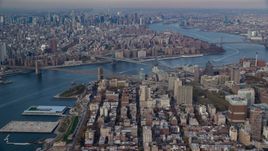 The Brooklyn and Manhattan Bridges spanning the East River in Autumn, New York City Aerial Stock Photos | AX120_091.0000087F
