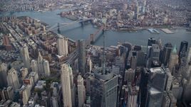 One World Trade Center spire, East River and bridges in Lower Manhattan, New York City Aerial Stock Photos | AX120_104.0000143F