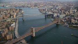 Manhattan and Brooklyn Bridges spanning the East River in New York City Aerial Stock Photos | AX120_128.0000261F