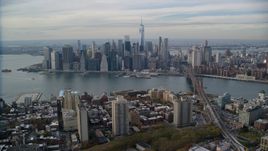 Lower Manhattan skyline and the East River seen from Brooklyn, New York City Aerial Stock Photos | AX120_133.0000080F