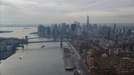 The Brooklyn and Manhattan Bridges beside Lower Manhattan, New York City Aerial Stock Photos | AX120_140.0000095F