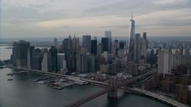 Part of the Brooklyn Bridge and Lower Manhattan skyscrapers, New York City Aerial Stock Photos | AX120_145.0000170F