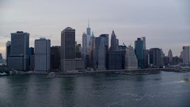 Lower Manhattan riverfront skyline at sunset, New York City Aerial Stock Photos | AX121_021.0000157F