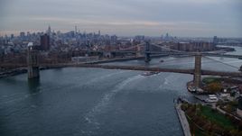 The Brooklyn and Manhattan Bridges at sunset in New York City Aerial Stock Photos | AX121_023.0000020F