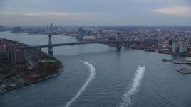 The Williamsburg Bridge and East River at sunset in New York City Aerial Stock Photos | AX121_026.0000133F