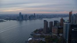 Downtown Jersey City at sunset seen from Lower Manhattan, New York City Aerial Stock Photos | AX121_035.0000051F