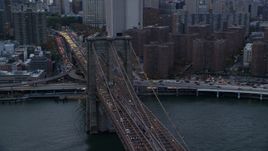 Downtown side of the Brooklyn Bridge at sunset in New York City Aerial Stock Photos | AX121_040.0000039F