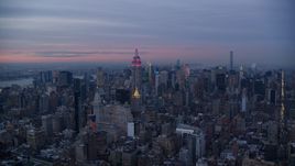 Midtown high-rises and the Empire State Building at sunset in New York City Aerial Stock Photos | AX121_079.0000199F