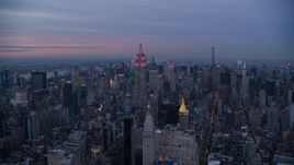 The Empire State Building and Midtown high-rises at sunset in New York City Aerial Stock Photos | AX121_081.0000054F
