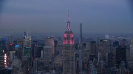 Top of Empire State Building at sunset in Midtown Manhattan, New York City Aerial Stock Photos | AX121_083.0000005F