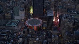 The Madison Square Garden arena at sunset in Midtown Manhattan, New York City Aerial Stock Photos | AX121_084.0000279F