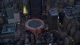 The Madison Square Garden arena at sunset in Midtown, New York City Aerial Stock Photos | AX121_085.0000087F
