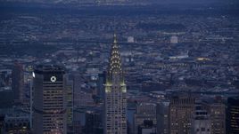 The tops of the MetLife and Chrysler Building in Midtown at sunset in New York City Aerial Stock Photos | AX121_090.0000279F