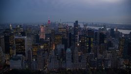 Tall Midtown Manhattan skyscrapers at sunset in New York City Aerial Stock Photos | AX121_101.0000104F